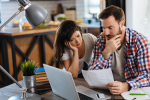 Couple looking at a bill
